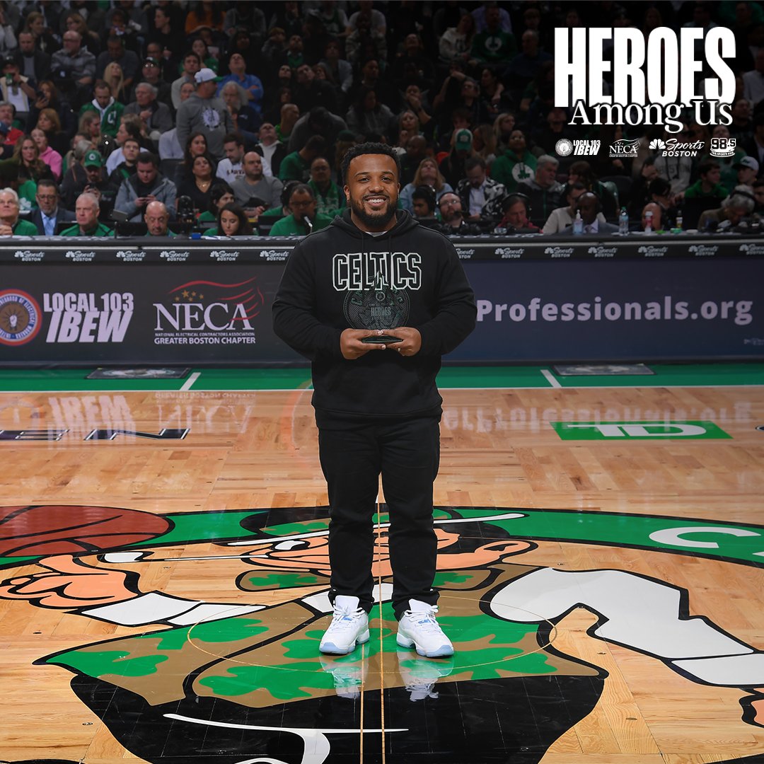 Dr. Ed-Dee Williams receiving the Boston Celtics Hero Among Us Award at center court